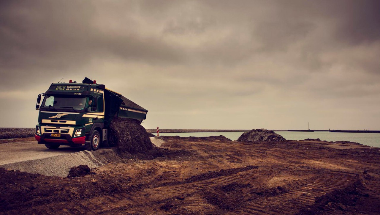Volvo truck dumping soil.